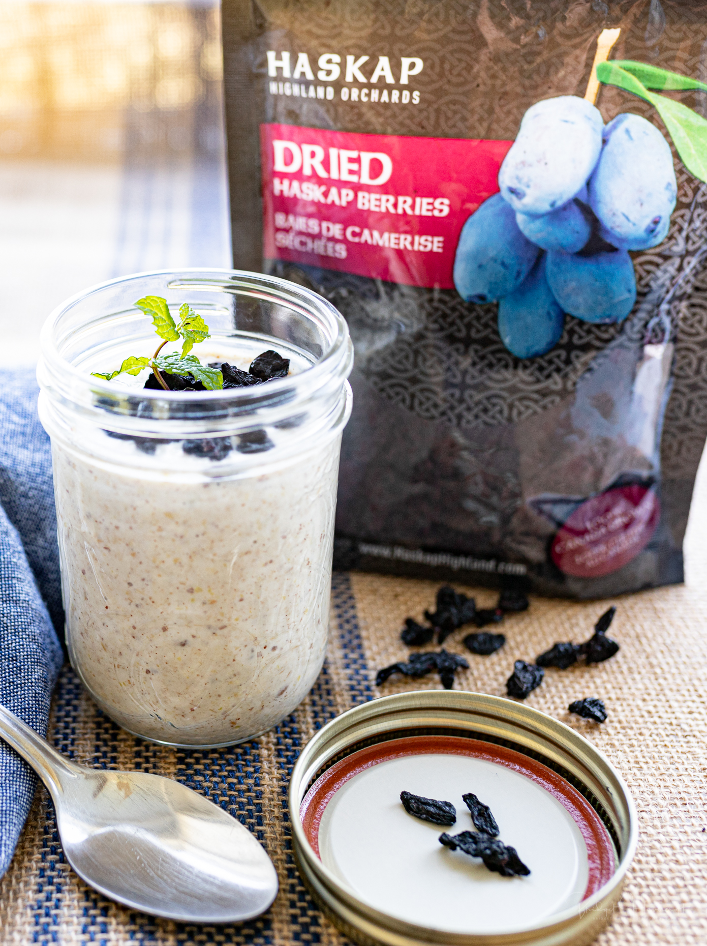 Haskap Highland Berries-Recipe ideas: dried berries on top of a jar of creamy breakfast oats